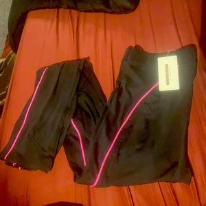 Black leggings with pink piping